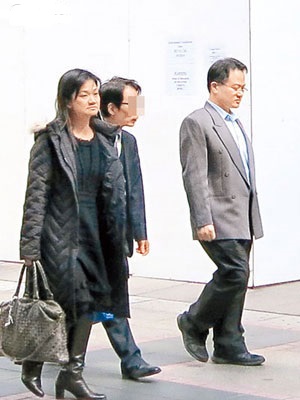 律師楊潤康（右）被裁定罪成，其妻羅婉清（左）則脫罪。